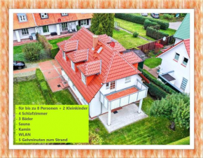 Haus Admiral mit Garten, 5 Gehminuten zum Strand, inklusive WLAN, Sauna, Kamin, Tischtennisplatte, Bollerwagen für den Strand